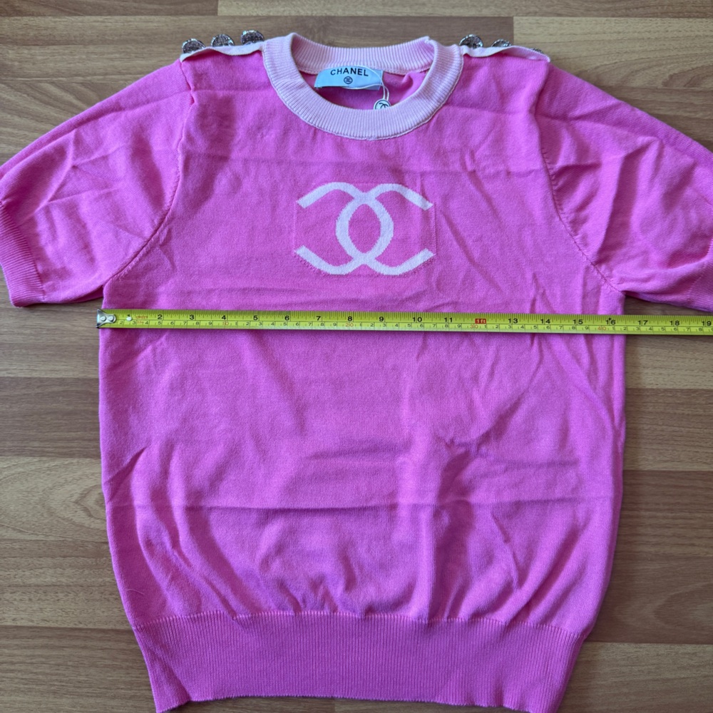 Pink Short Sleeve Sweater
No tag , measures as pictures